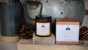 Grapefruit scented body butter in glass jar and kraft gift box.