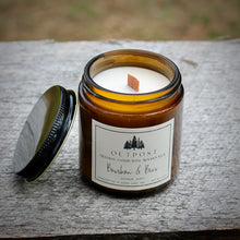 Load image into Gallery viewer, Bourbon and Bees beeswax candle showing wooden wick and black metal screw cap