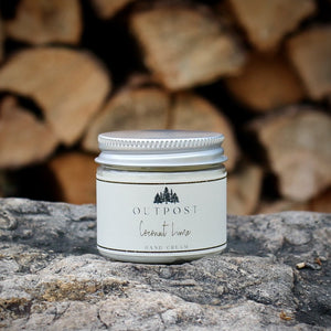 Coconut Lime hand cream in clear jar with metal lid